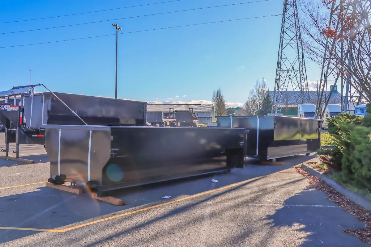 Roll-off dumpster ready for waste disposal at job site for 2 Yard Dumpster Rental in Sultan